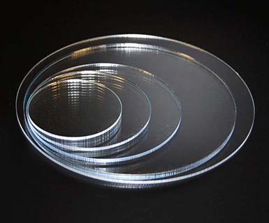 laser-cut clear acrylic circles with smooth edges from 2 to 14 inch diameters