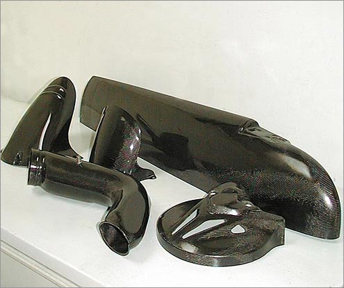 Multiple car, motorcycle, and aeronautic parts made using TAP Carbonfiber and Specialty Resins.